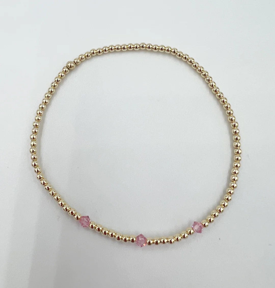 2MM 14K GOLD LEAVE ON WITH PINK CRYSTALS - SASKIA DEVRIES