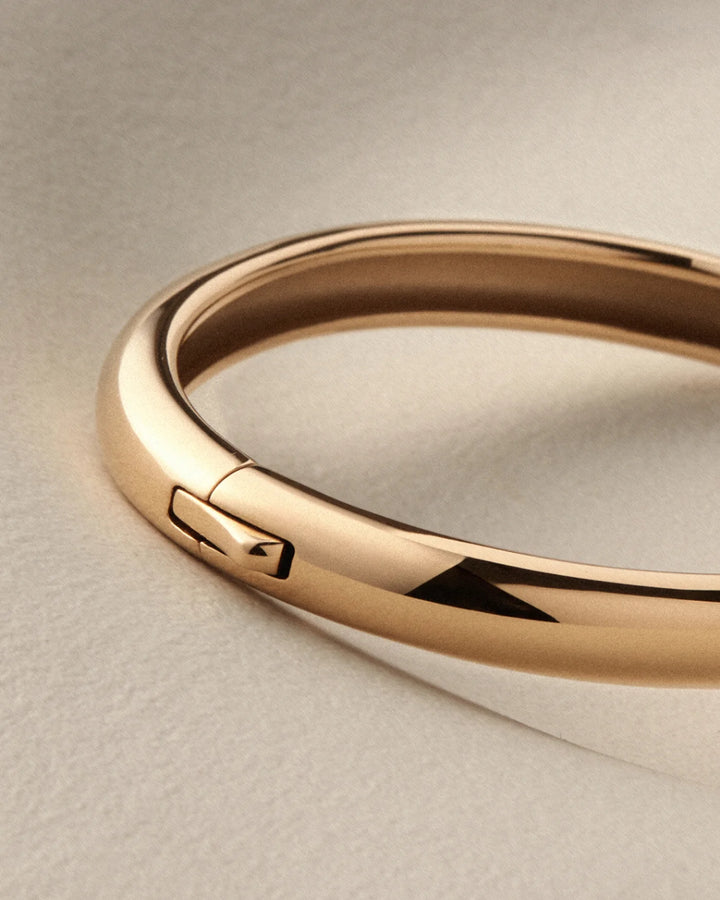 GIA BANGLE M/L (GOLD) - JENNY BIRD